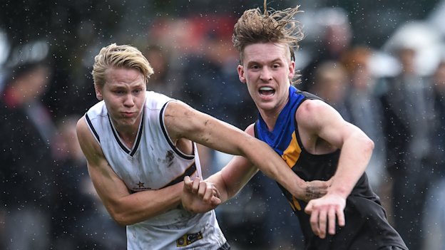 Noah Anderson (right) is set to join his best mate and Carey teammate Matt Rowell at Gold Coast.