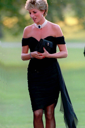 Princess of Wales wearing a black pleated chiffon dress with floating side panel by Christina Stamboulian at a party given at the Serpentine Gallery in London, 1994.