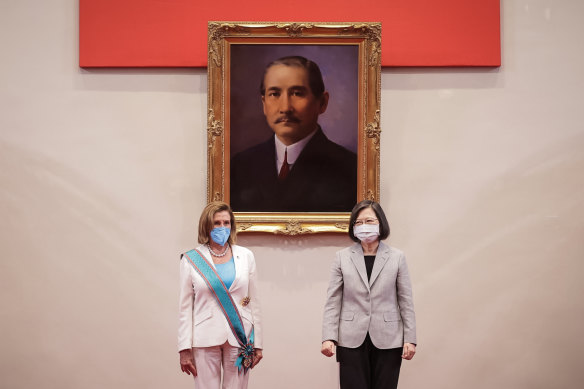 Nancy Pelosi received the Order of Propitious Clouds with Special Grand Cordon from Taiwan President Tsai Ing-wen in August. The portrait is of Chiang Kai-shek.