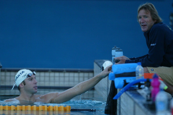 Denis Cotterell with Australian swimming great Grant Hackett in 2006.