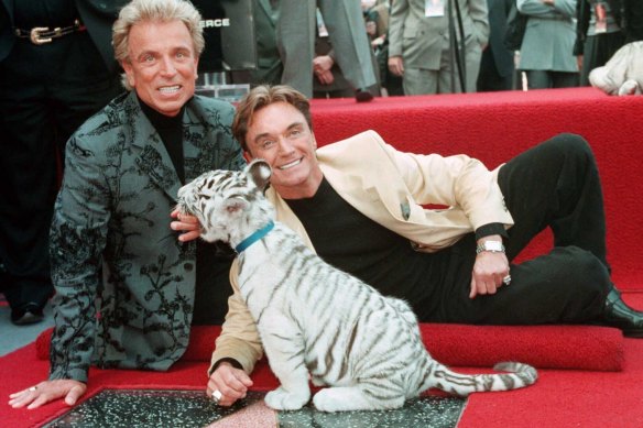 Siegfried Fischbacher, left, and Roy Horn, pictured in 1994 at their star on the Hollywood Walk of Fame.