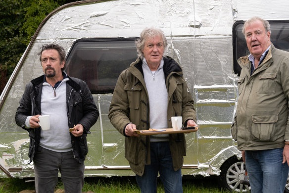 On the road again: Hammond, May and Clarkson drive across Scotland.