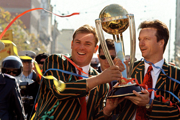 Shane Warne and captain Steve Waugh at a victory parade in Melbourne after victory at the 1999 World Cup.