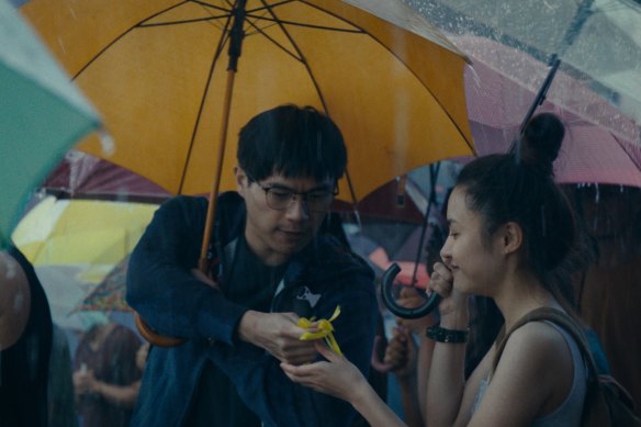 Tony (left), a protester in the Umbrella Movement in Expats.
