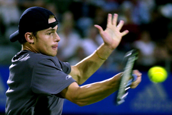 Andy Roddick hits a forehand in 2002.