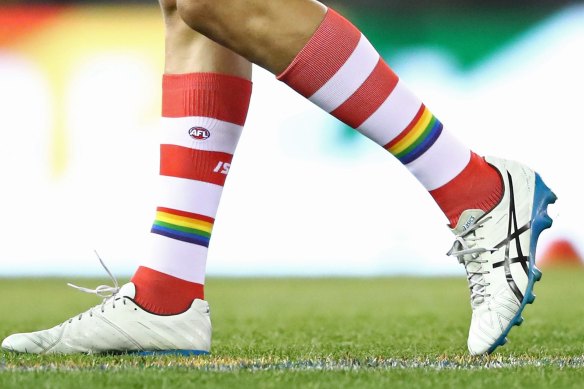 Lance Franklin of the Swans wears rainbow-coloured socks during the round 21 AFL match between the St Kilda Saints and the Sydney Swans.