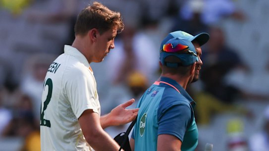 Australia’s Cameron Green walks from the field after injuring his finger.
