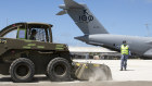 Australian Defence Force personnel sweep volcanic ash from Tonga’s Fuaʻamotu International Airport.