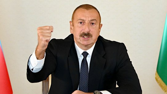Azerbaijani President Ilham Aliyev gestures as he addresses the nation in Baku, Azerbaijan on Sunday following the clashes. 