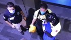 Airport officials care for the abandoned baby in 2020.