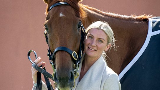 Melbourne Cup winning jockey Jamie Melham stands with Half Yours less than 24 hours after the brilliant win.
