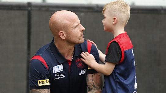 Nathan Jones, pictured with his young son Remy.