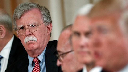 The hawkish John Bolton (left) is now loathed by Republicans and Democrats.