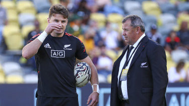 Beauden Barrett (left) chats with All Blacks coach Ian Foster (right) ahead of the 100th Test between the sides. 