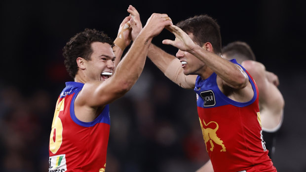 Cameron Rayner of the Lions  celebrates a goal during the clash with St Kilda.
