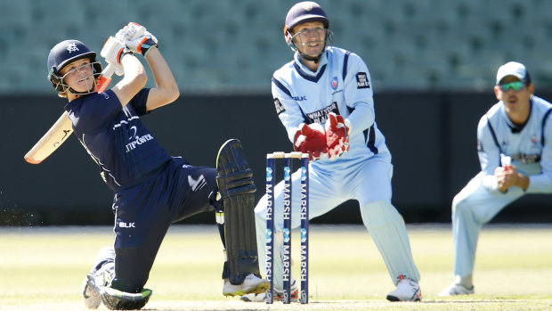 Taking the long handle: Jake Fraser-McGurk on his way to a half-century for Victoria in the Marsh Cup clash against NSW at the MCG.