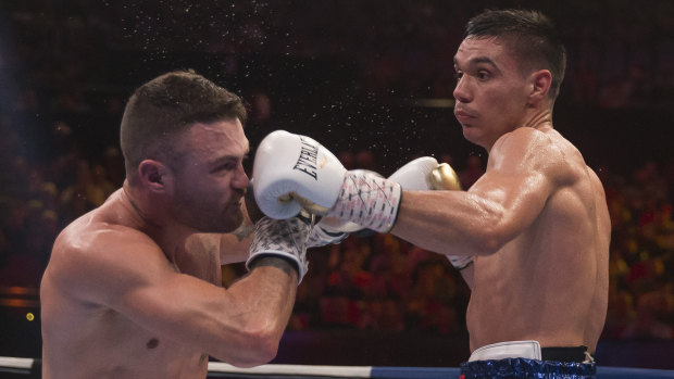On the nose: Tim Tszyu lands a left on Dwight Ritchie during his unanimous points decision over his fellow Australian.