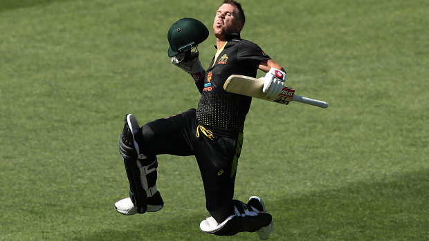Back in black: Australian batsman David Warner celebrates reaching his century in the T20 series opener against Sri Lanka at Adelaide Oval.