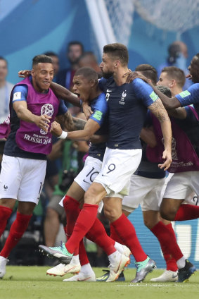 France players celebrate after Kylian Mbappe, second left, scores his side's fourth goal against Argentina.