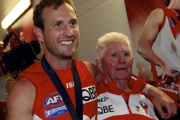 Swans star Jude Bolton with Kenny Williams after their 2012 grand final win.