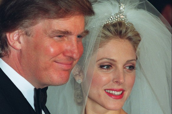 Donald Trump and Marla Maples pose for photographers following their wedding ceremony in New York, in December 1993.