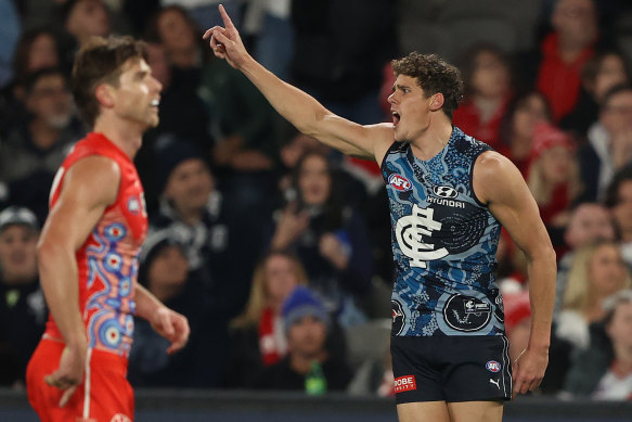 Charlie Curnow celebrates one of his goals.