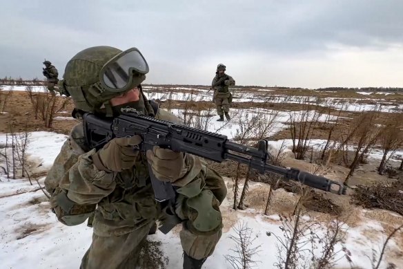 In this photo made from video provided by the Russian Defence Ministry Press Service on Saturday, February 19, 2022, Russian marines take their position during the Union Courage-2022 Russia-Belarus military drills at the Obuz-Lesnovsky training ground in Belarus. 