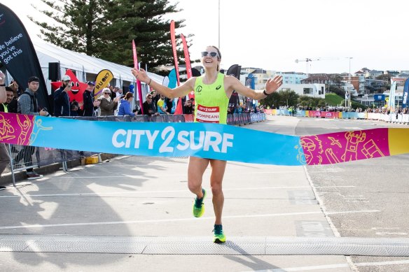 Leanne Pompeani crossed the finish line in 45 minutes and 43 seconds on her competitive debut, buoyed by the race's carnival atmosphere.
