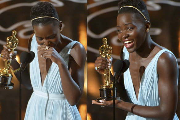 Lupita Nyong'o accepting the award for best actress in a supporting role.