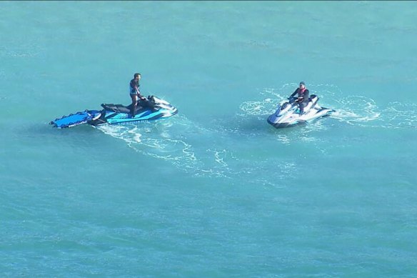 Lifeguards search for the shark at Coogee.