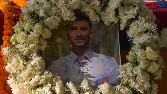 Nepalese pay their respects to Bipin Joshi.