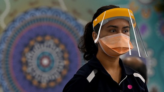 A healthcare worker at the South Western Sydney Vaccination Centre.