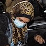 Islamic State-linked woman Kirsty Rosse-Emile gets into a car after arriving at Melbourne Airport this evening.