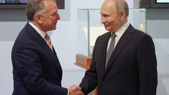 Russian President Vladimir Putin, right, and US President Donald Trump’s special envoy Steve Witkoff greet each other before their talks in St. Petersburg, Russia, overnight.
