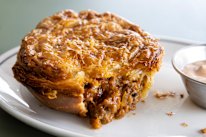 Falco’s Rockwell pie comes with a side of special sauce.
