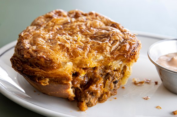 Falco’s Rockwell pie comes with a side of special sauce.