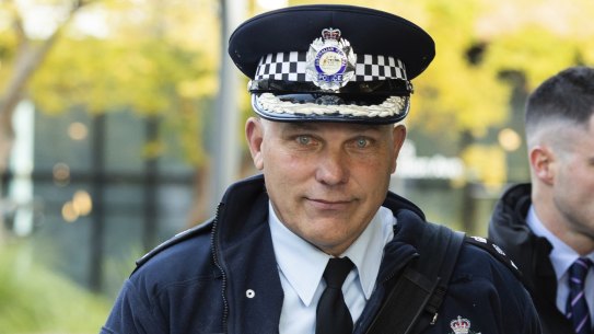 Detective Superintendent Scott Moller departs the ACT Civil and Administrative Tribunal in Canberra.