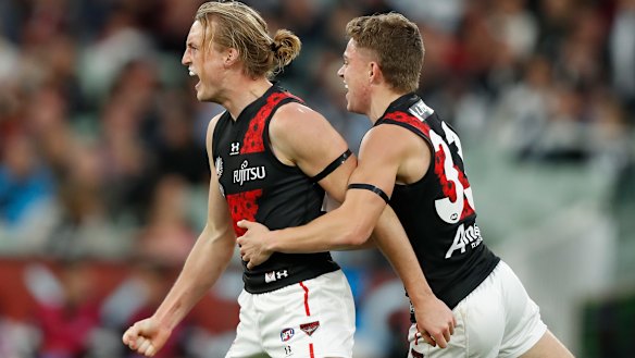 Mason Redman (left) during Essendon’s Anzac Day triumph over Collingwood.