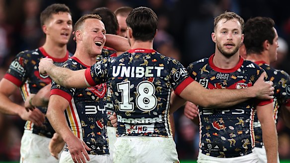 Daly Cherry-Evans and the Roosters celebrate victory over Penrith on Thursday night.