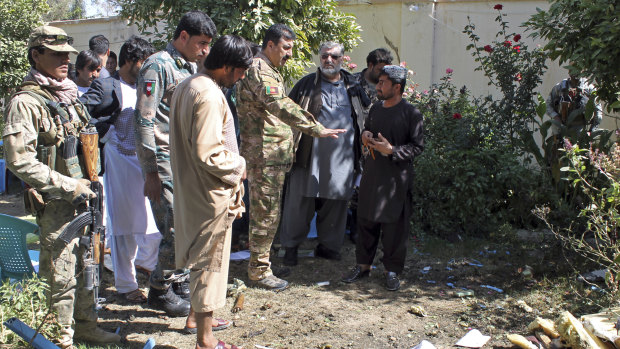 Security forces investigate an explosion that killed Abdul Jabar Qahraman, a candidate in parliamentary elections, at his home in Lashkar Gah, the capital of southern Helmand province, Afghanistan.