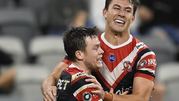 Luke Keary and Joseph Manu celebrate another Roosters try.