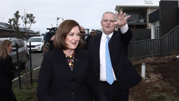 Prime Minister Scott Morrison campaigning with the member for Corangamite, Sarah Henderson, on Wednesday morning. 