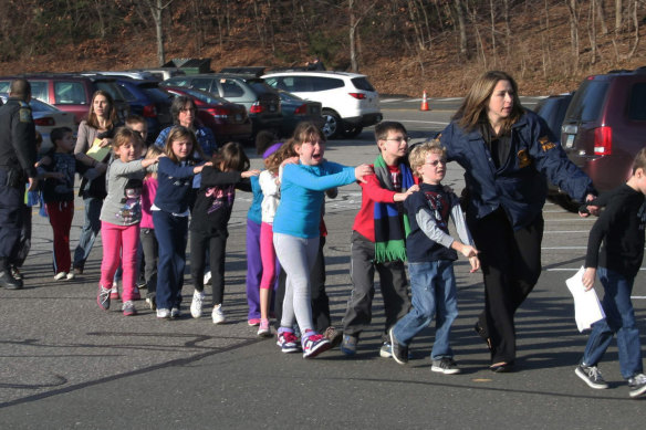 After the shooting, the children leave Sandy Hook School.