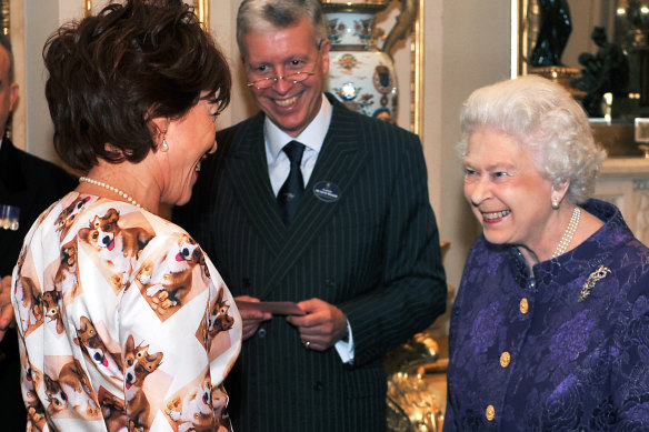 The Queen was impressed by the corgi-in-a-crown outfit worn by Kathy Lette during a royal reception for Australians living in the UK in 2011.