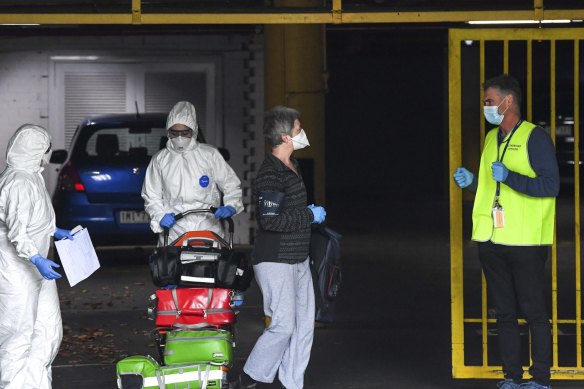 Returned travellers were overseen by private security guards at Rydges on Swanston hotel.