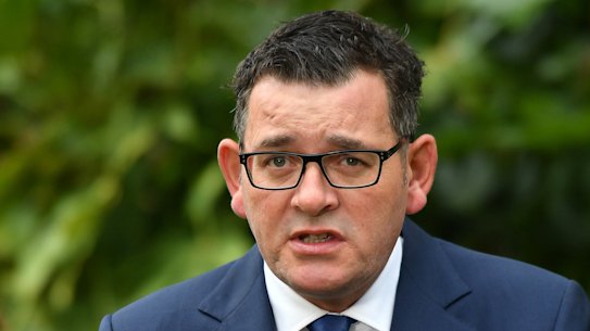The Premier, Daniel Andrews, and the Minister for Health, Jenny Mikakos, make an announcement on COVID-19 at Parliament rear garden. 