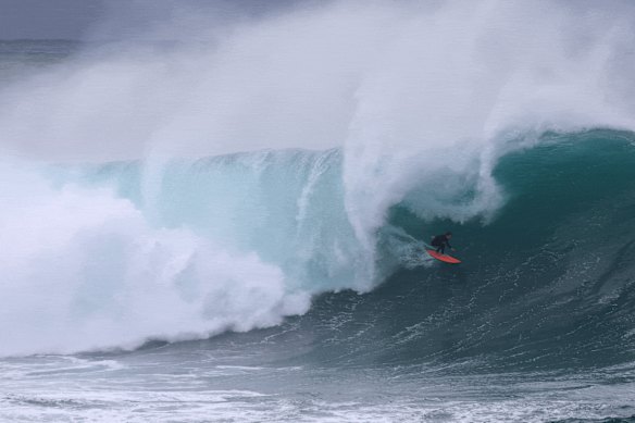 Swimmer rescued from Bondi surf as Sydney is battered by powerful winds and huge swells