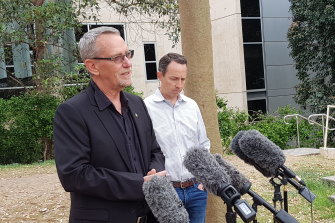 UQ scientists Professor Paul Young (left) and Professor Trent Munro in December 2020 announcing the vaccine was being halted.