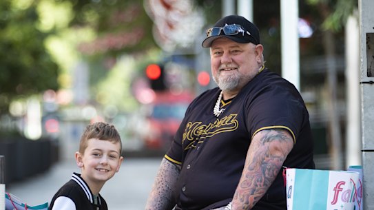 Derek and Jackson Glennie in Melbourne’s CBD on Christmas Day. 