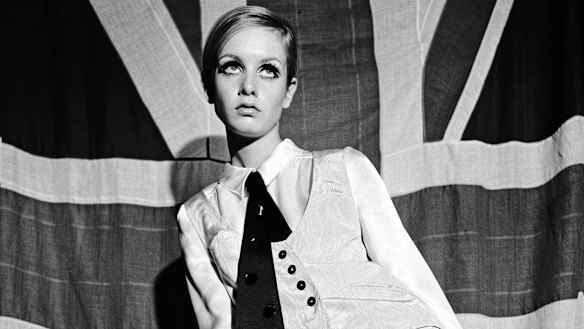 British model Twiggy modelling a Mary Quant waistcoat and shirt ensemble in 1966.

